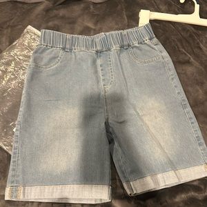 Light blue jean shorts elastic top, no button or zipper new in bag.